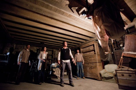 "INT PERRON HOUSE - CELLAR Carolyn flips upside down and shoots up to the ceiling John Brotherton (Brad), Vera Farmiga (Lorraine), Patrick Wilson (Ed), Ron Livingston (Roger)"
